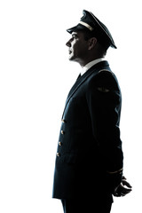 man in airline pilot uniform silhouette - obrazy, fototapety, plakaty