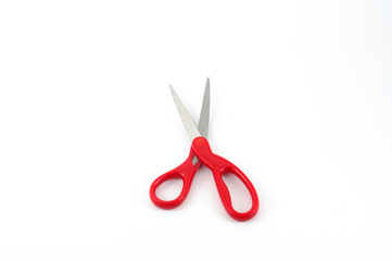 The red scissors, isolated on white background