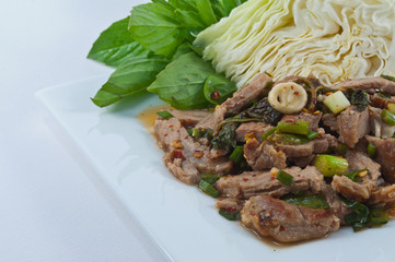 Thai spicy food  Pork mixed with lemon pepper and spices And veg