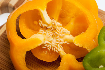 close up of red, yellow and green peppers