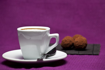 Coffee cup on a purple background