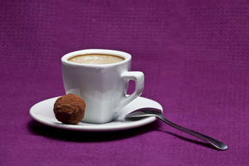 Coffee cup on a purple background