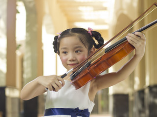 girl playing violin © allensima