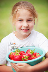 girl with strawberries