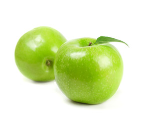 Fresh green apples on white background