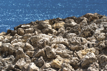 Landscape with stones coast and sea at far