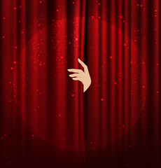 female hand disclose the scene shifting the red curtain