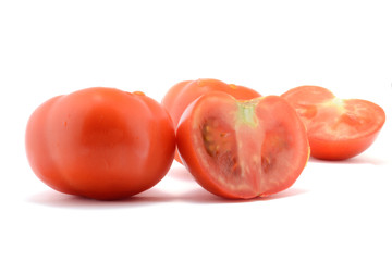 Fresh tomatoes isolated over white background