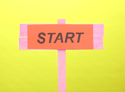 Fototapeta Start wooden board on green background