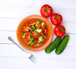 Fresh salad with tomatoes and cucumbers