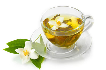 cup of green tea with jasmine flowers isolated on white