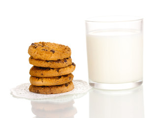 Glass of milk and cookies isolated on white
