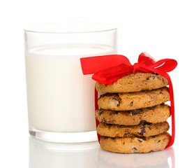 Glass of milk and cookies isolated on white
