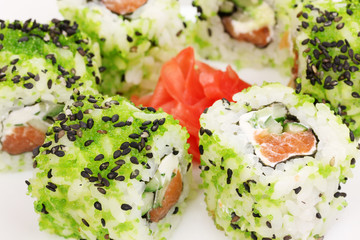 Tasty rolls served on white plate close-up