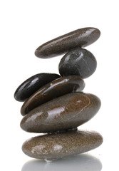 Stack of balanced stones isolated on white