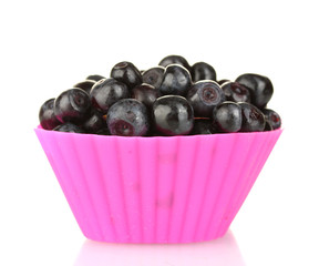 Fresh blueberries in colorful silicone mold isolated on white