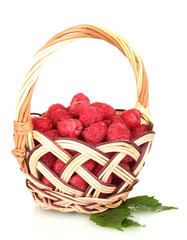Fototapeta na wymiar Fresh raspberries in wicker basket isolated on white