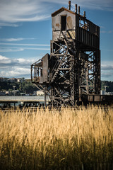 Fototapeta na wymiar Rusty old shipping terminal with a blue sky