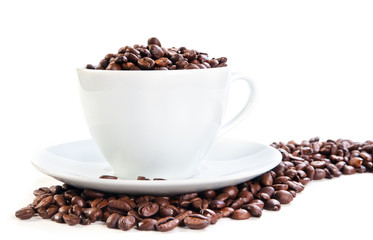 Cup full of coffee beans