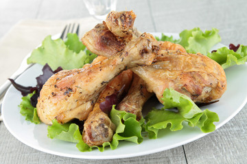 grilled chicken drumsticks and salad