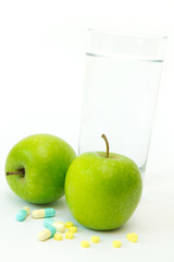 Green apple with slimming pills