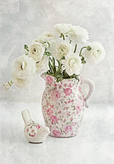 White Ranunculus.soft focus and old paper texture .