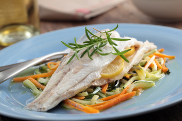 Baked sea bass with vegetables