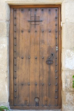 close-up image of ancient spanish door.