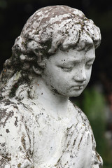 Statue Of Women On Tomb