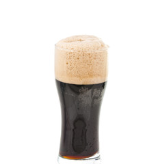 a glass of dark beer isolated