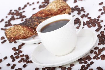 Cup of coffee at the angle and cookies