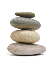 Balancing rocks isolated against white background