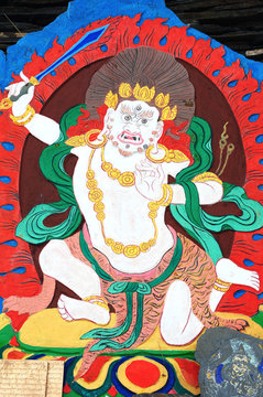Ancient Tibetan wall painting art of buddha