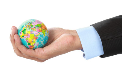 hand holding a globe