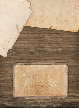 Vintage papers on a wooden background