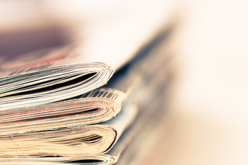 A large stack of magazines piled high.