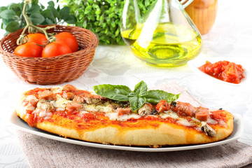 Italian pizza with tomato and basil