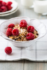 Muesli with fresh raspberries and dried fruits