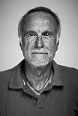 High contrast black and white portrait of senior man