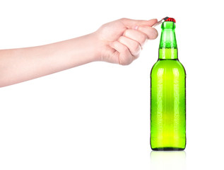 hand opening beer bottle with metal opener