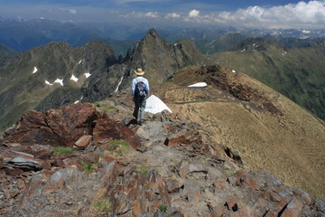 walker on mountain range in Aragon Pyrenees