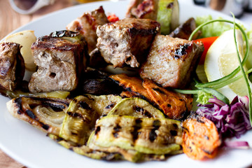 Meat grill and grilled vegetables