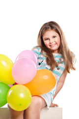 Fototapeta na wymiar Happy girl with balloons