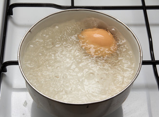 egg is cooked in a pan