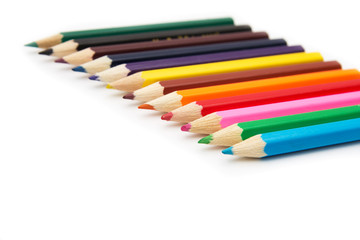 Colour pencils isolated on white background close up