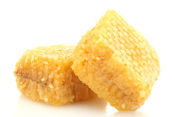 golden honeycombs isolated on white.