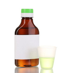 Medical bottle and jigger isolated on white