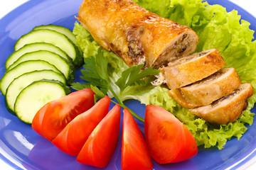 Tasty meat cutlet with garnish on plate close-up