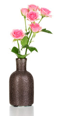 Pink roses in vase isolated on white