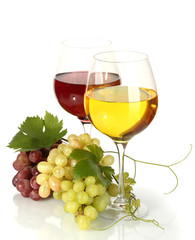 glasses of wine and ripe grapes isolated on white